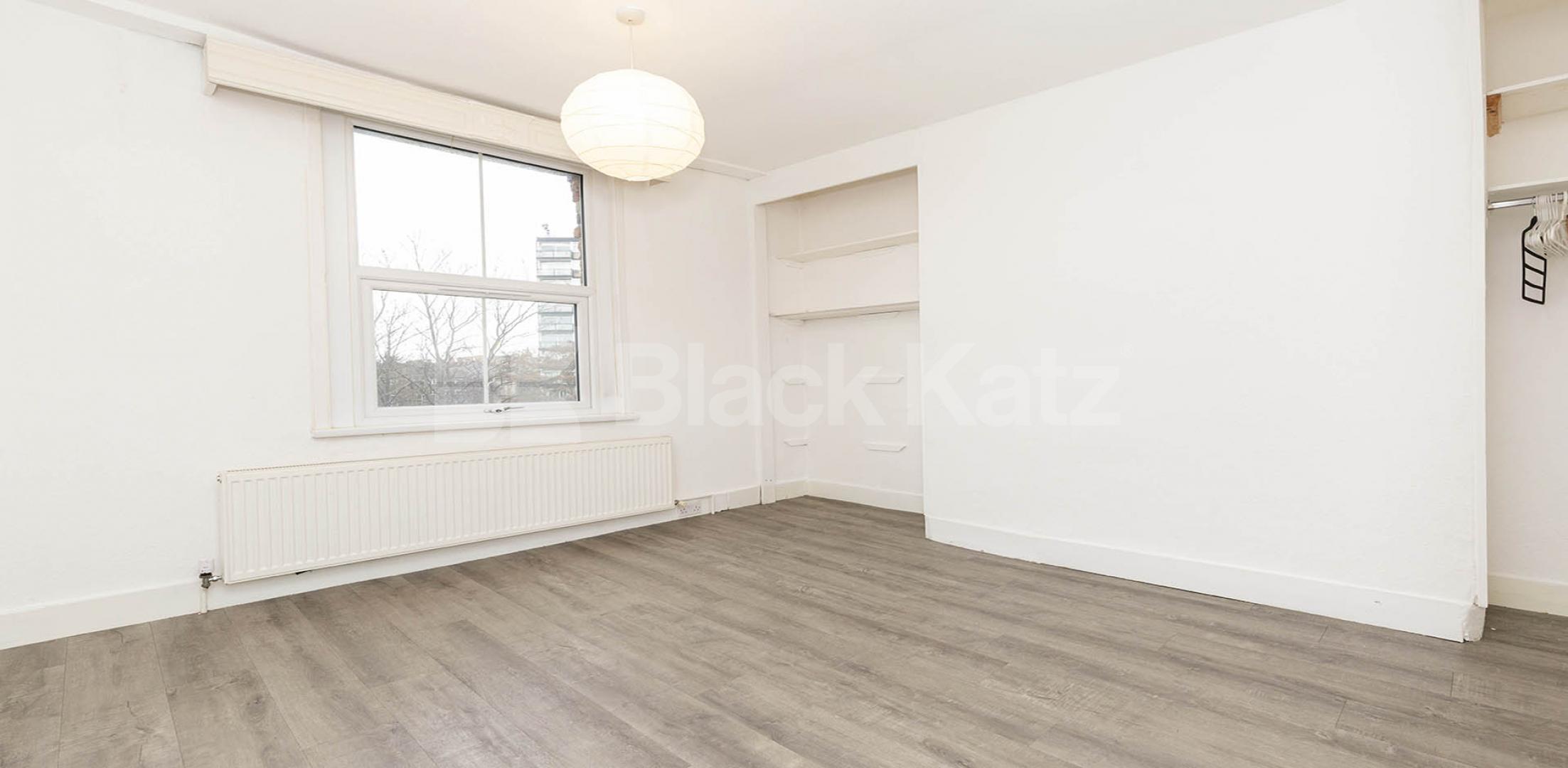 Split over two floors a large 3 bedroom apartment with kitchen diner Hungerford Road, Hillmarton Conservation Area 